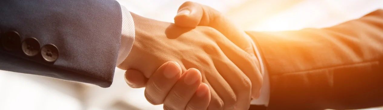 Handshake 1265x365.jpg
