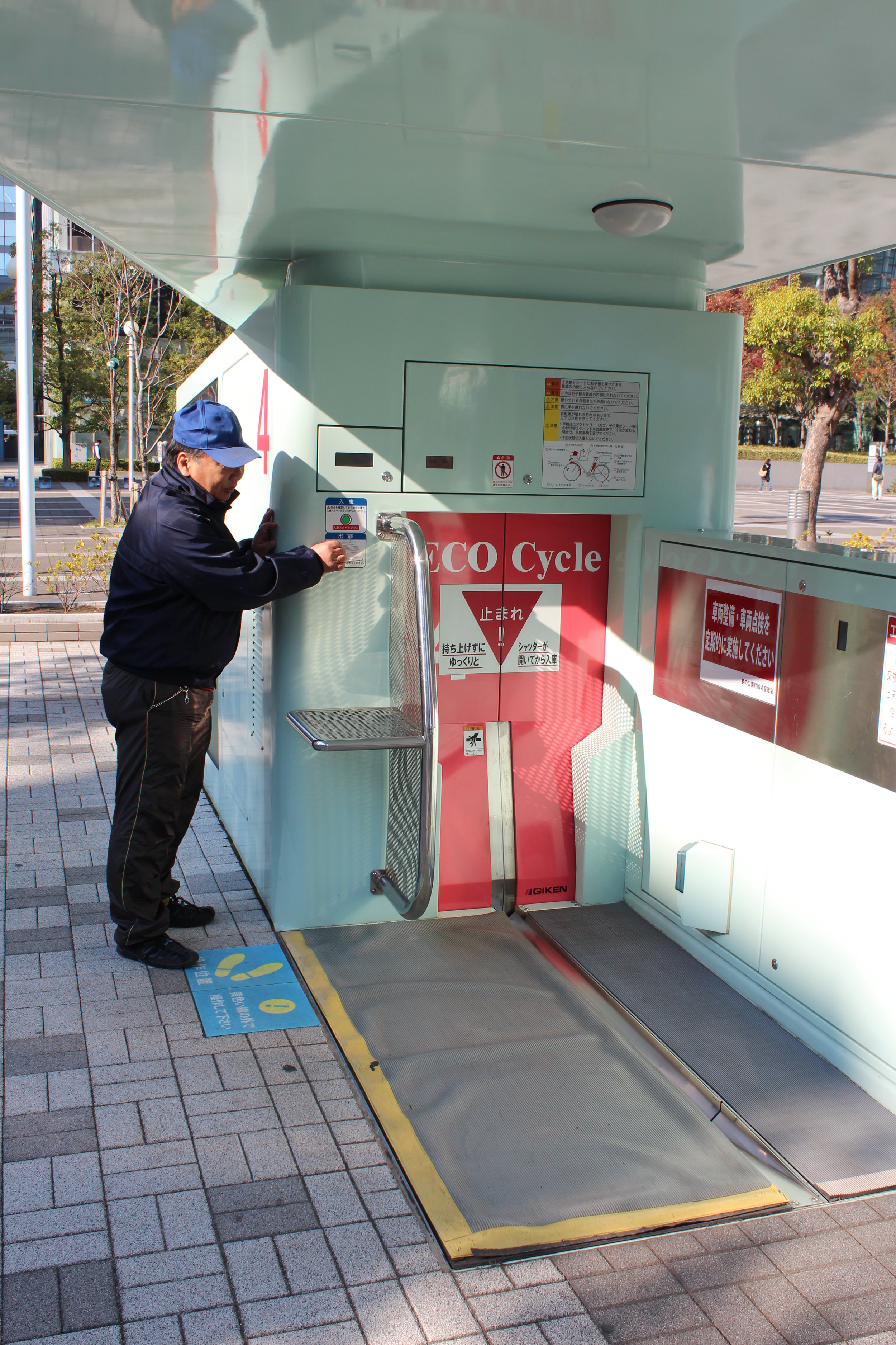   Amazing Tokyo bike parking pulls bike into device and in seconds it's in a secure underground carousel.  