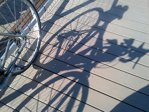 Cool bike shadow on Coney pier Fall 2013.jpg