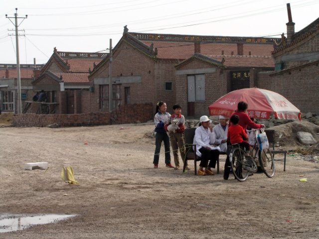 Across the country villages set of quarantines, keeping SARS out by keeping people out.jpg