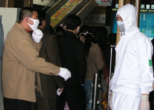 Eventually authorities stopped people fleeing Beijing if they had fevers or symptoms of SARS.11.jpg