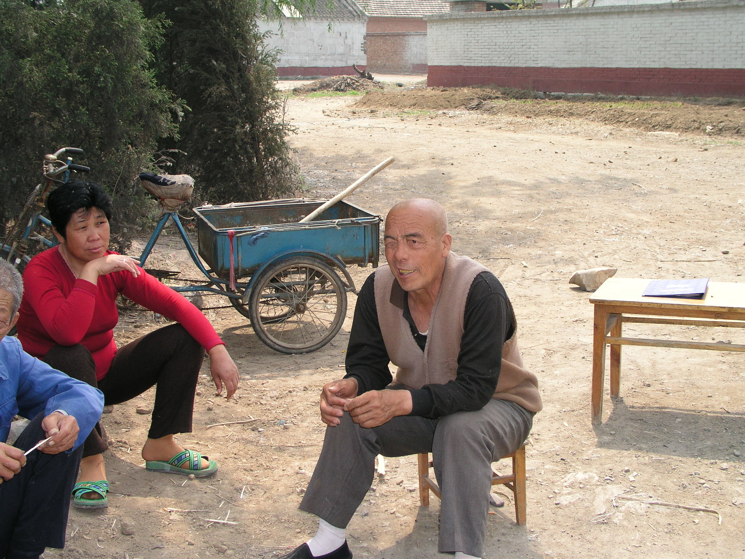 In a village north of Beijing the elders said no outsiders allowed , in hopes of keeping SARS out, even if it hurt their vegetable sales.2.JPG