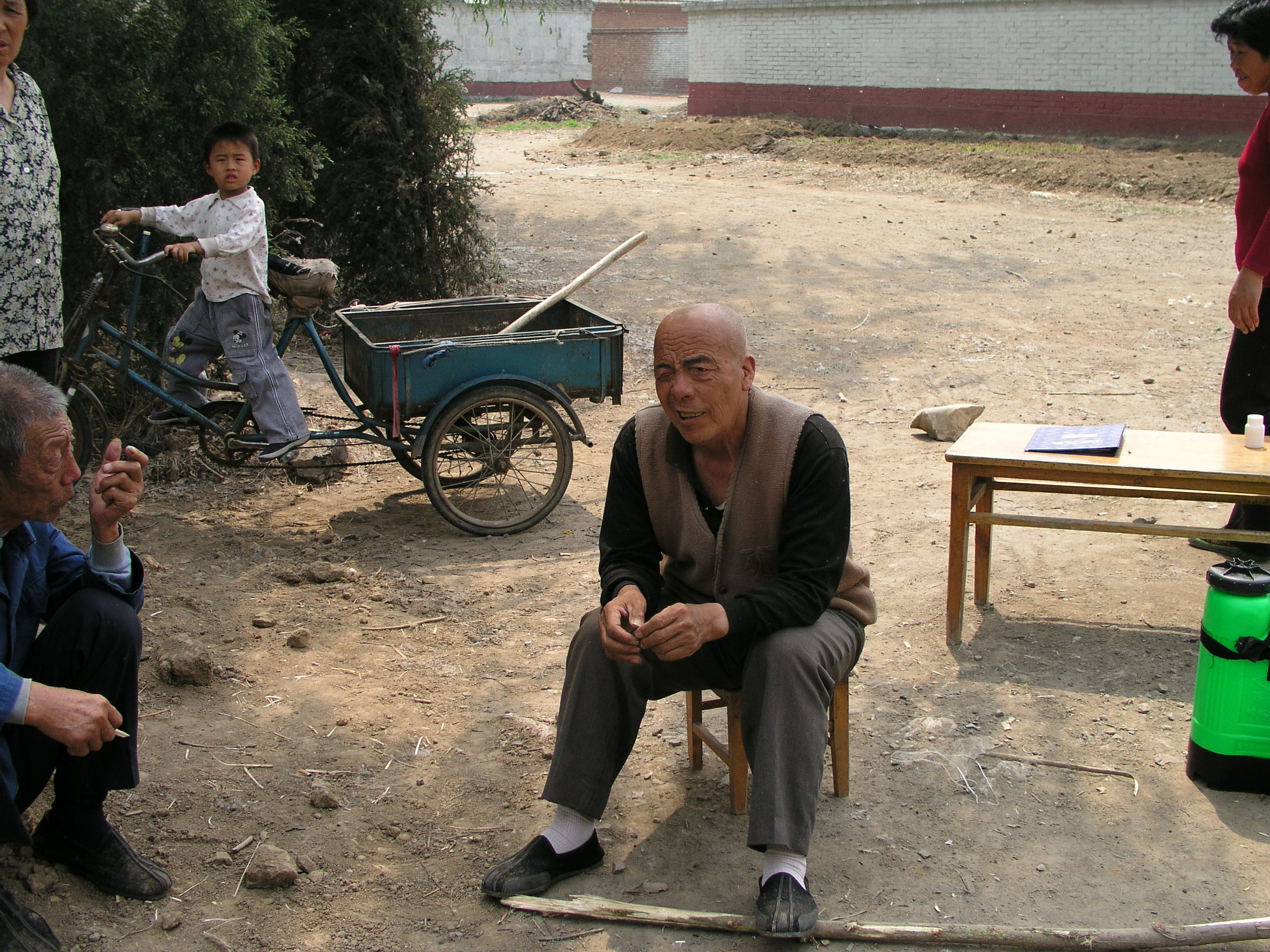 In a village north of Beijing the elders said no outsiders allowed , in hopes of keeping SARS out, even if it hurt their vegetable sales.7.JPG