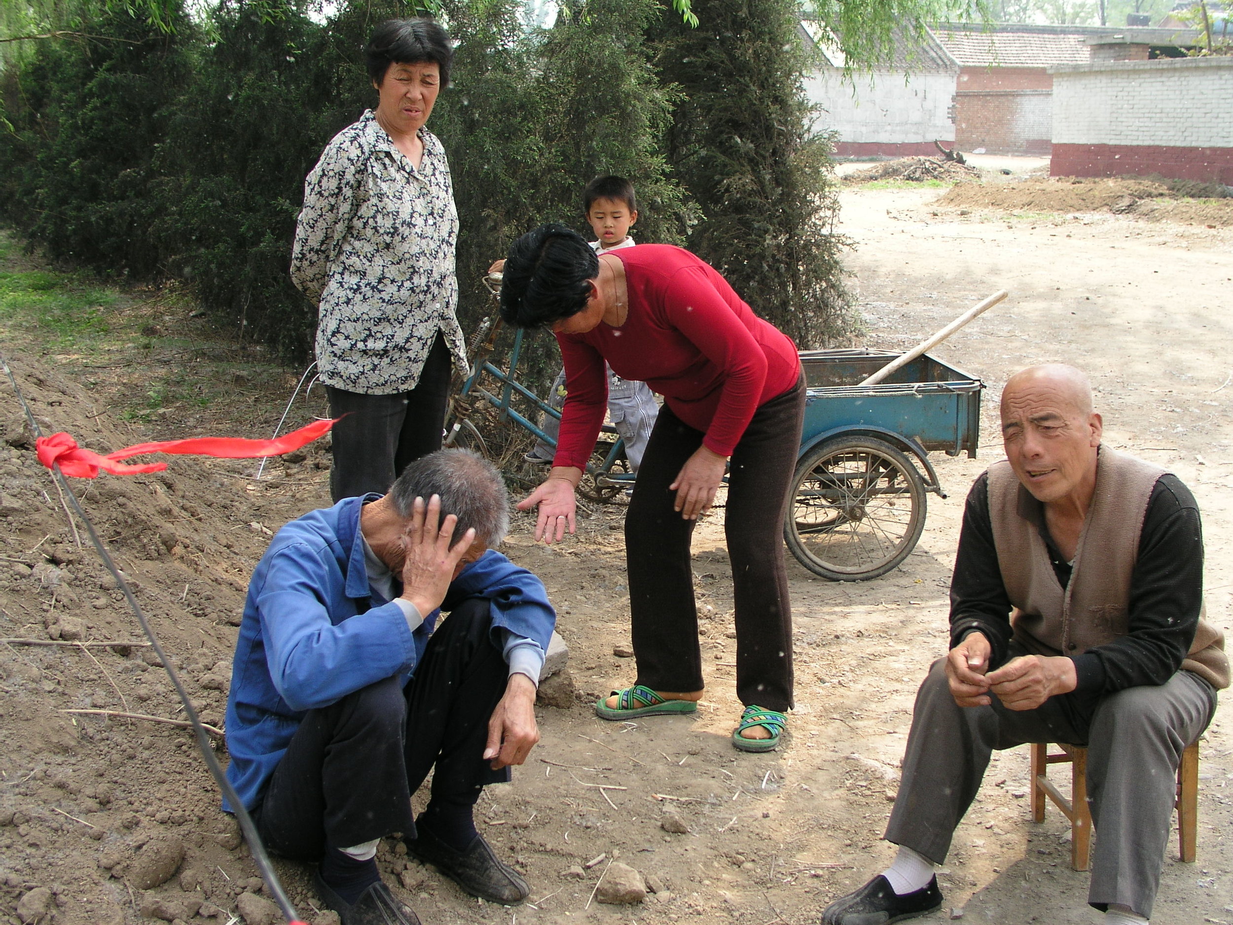 In a village north of Beijing the elders said no outsiders allowed , in hopes of keeping SARS out, even if it hurt their vegetable sales.9.JPG