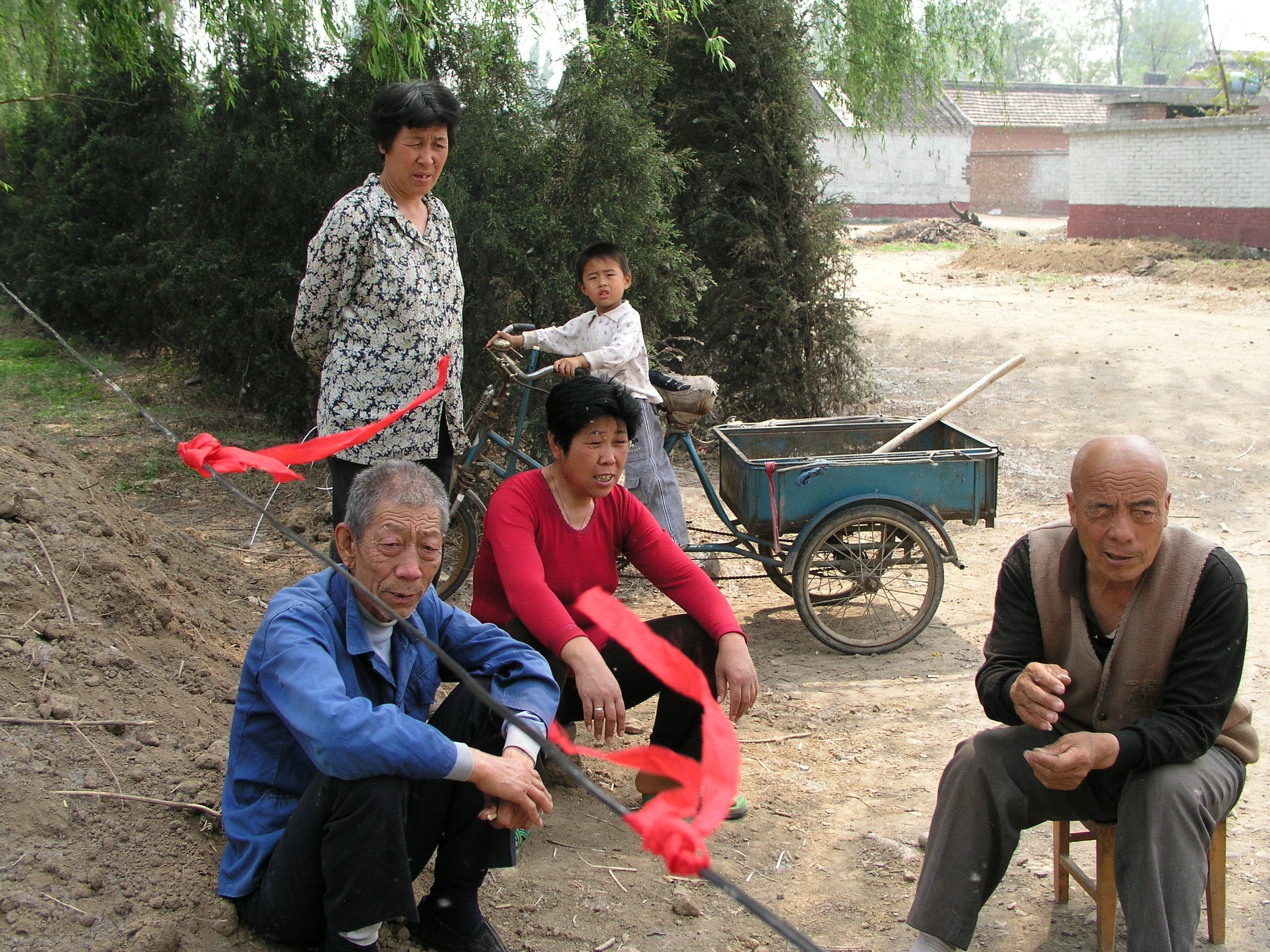 In a village north of Beijing the elders said no outsiders allowed , in hopes of keeping SARS out, even if it hurt their vegetable sales.11.JPG