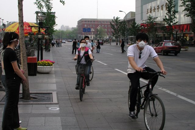 Late April in Beijing, where even outdoors people wore masks against SARS .jpg