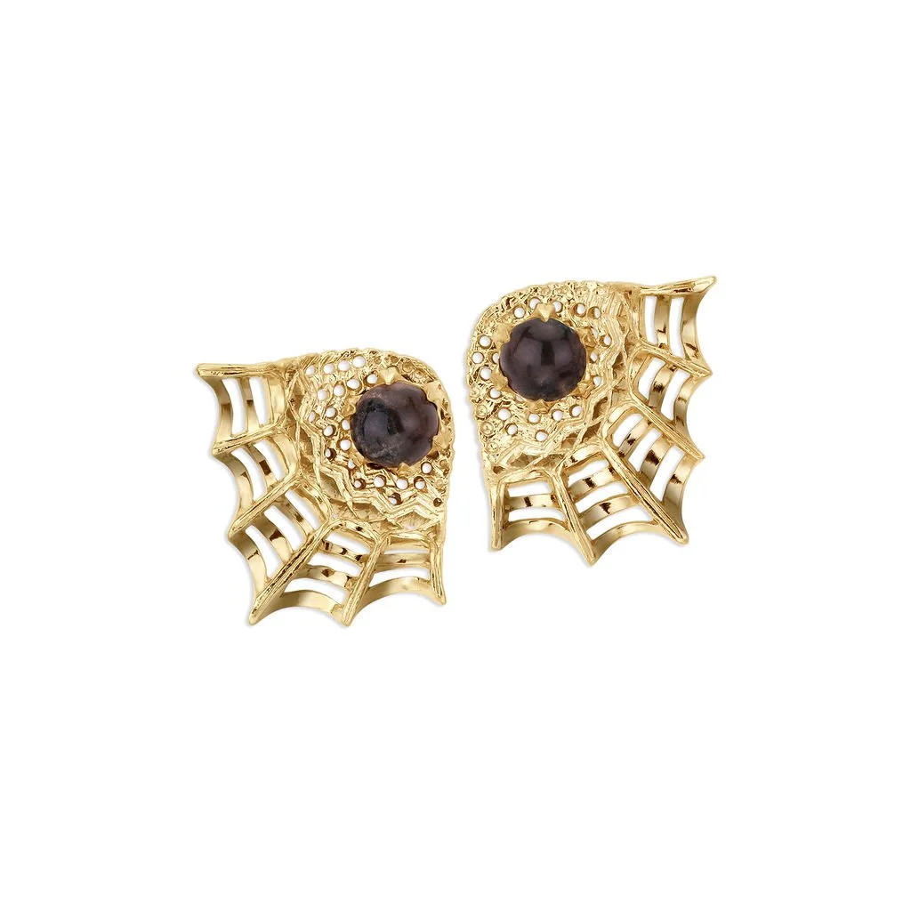 KAJD_Oppenwark_studs_and_ear_jackets_in_yellow_gold_with_Riebeckite_Felsite_Shetland_stone.jpg
