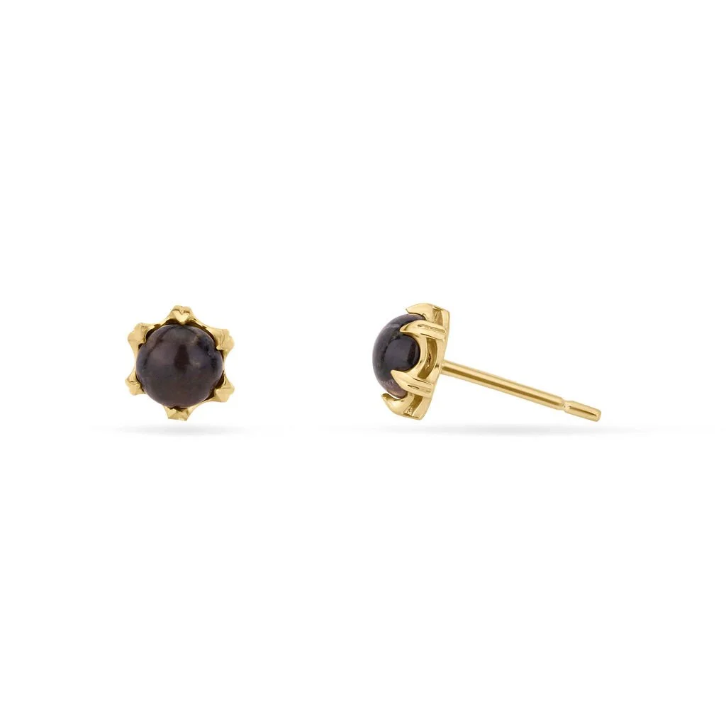 KAJD_Oppenwark_stud_in_yellow_gold_with_Riebeckite_Felsite_Shetland_stone.jpg