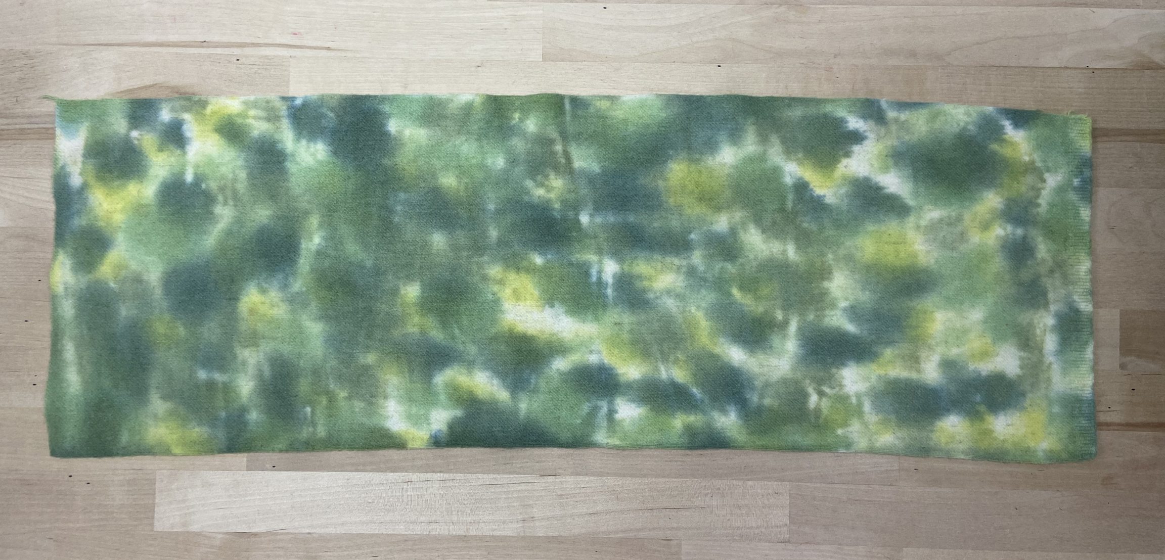 An Experiment Using Color Remover on Recycled Wool Fabric for Rug Hooking 