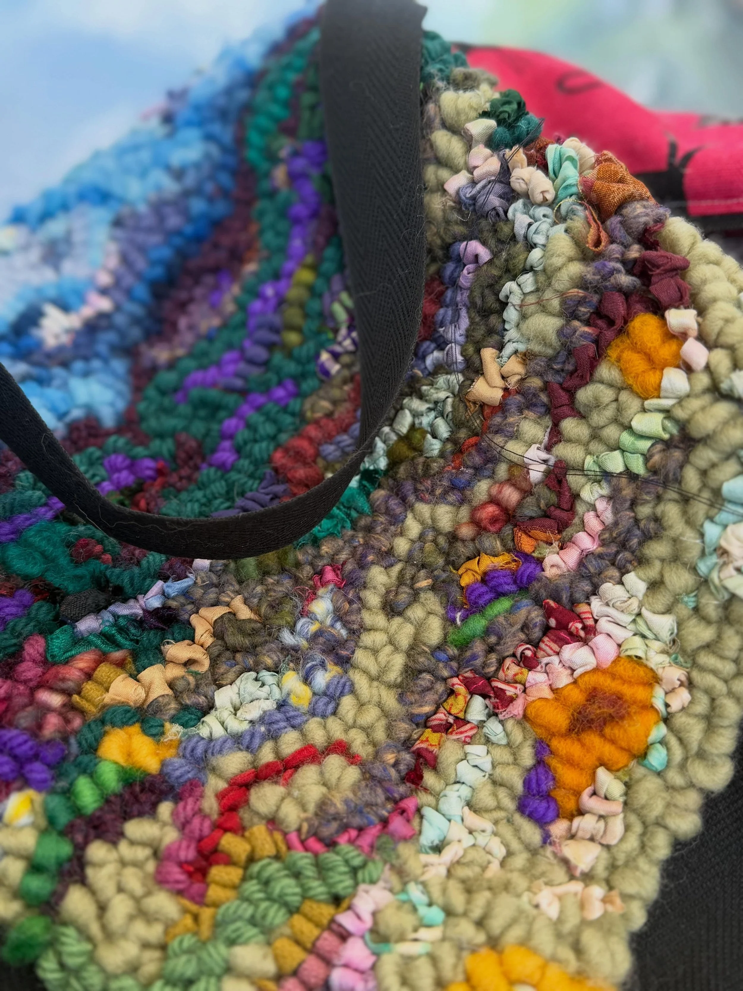 Doing some al fresco sewing this hot afternoon. Still binding all my landscapes! #rughooking #rugmaking #hookedrug #fiberart #textileart
