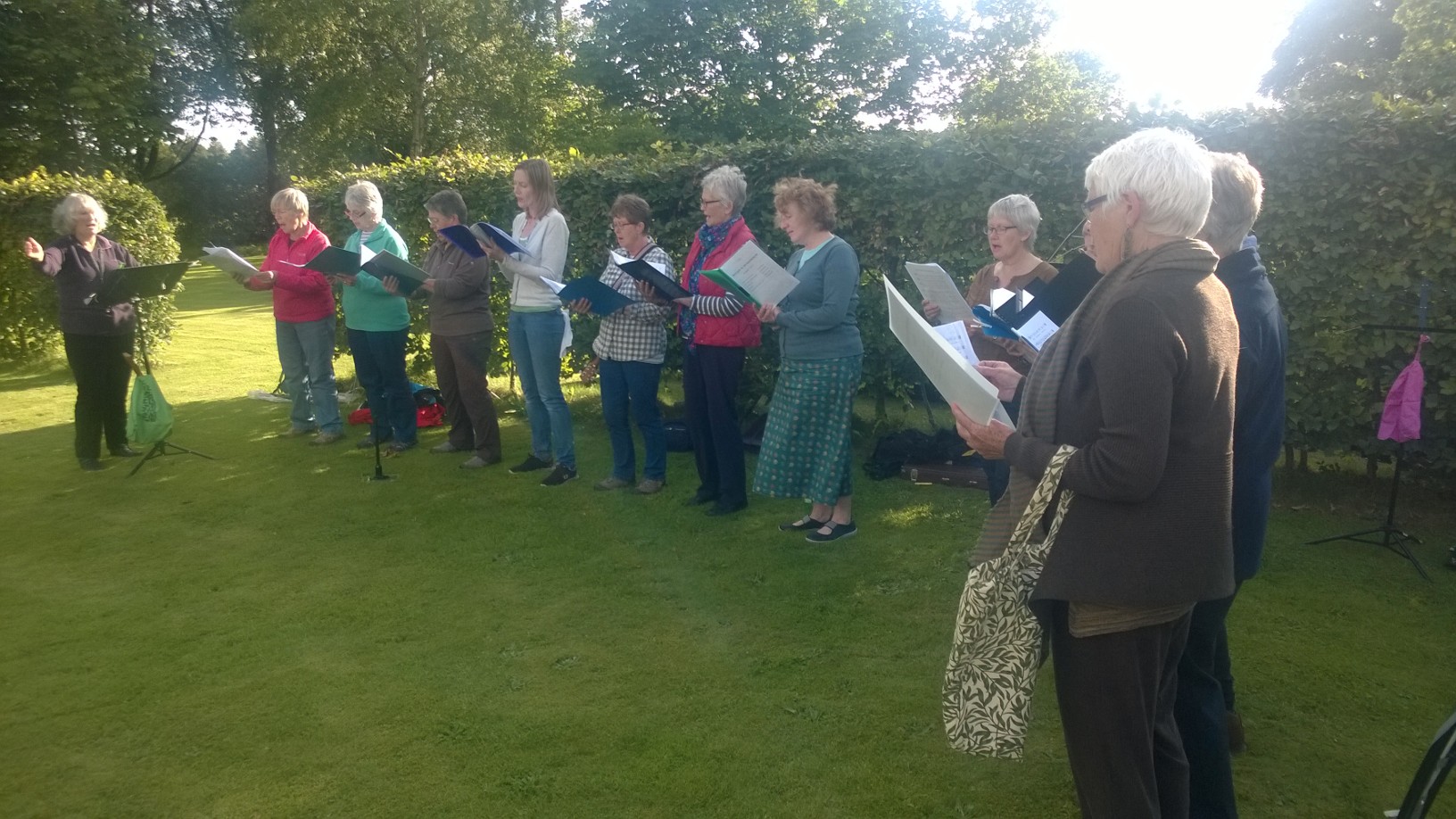 The Bridge Singers in the sunshine at Felton Park