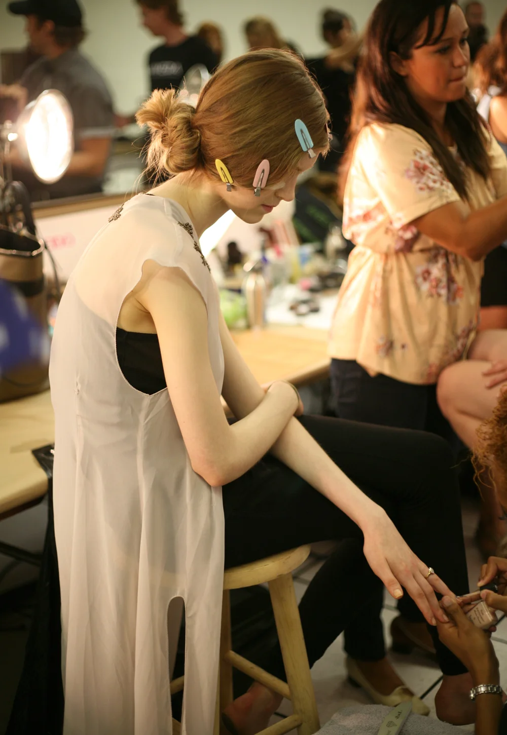 I had an ah-ha moment backstage at Band of Outsiders . Lately I’ve been craving a simpler nail … I think I blinged myself out, ombréd myself into a corner, etc. But at the same time, nude seems so boring! Enter:
Hyper-natural nude.
So simple - two cult products: Butter London Nail Foundation , followed by Butter London Matte Finish Topcoat .
The result is a look that resembles your soft, smooth natural nail but on beauty steroids. The models loved it as it’s one of those rare tricks amongst the high artistry of backstage that you know you’ll use “in real life.”
Hair by Aveda; makeup Shiseido; nails Butter London
Images: Cult of Pretty