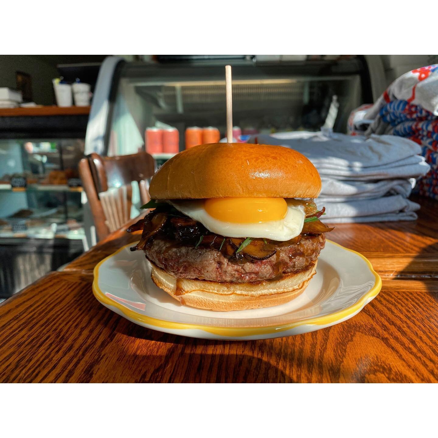 teriyaki @tworivermushroom burger with sunny egg n scallions  for you today. big thanks to two river for surprising us with a box of beautiful local shrooms this weekend. you sure know how to make a place feel loved.
