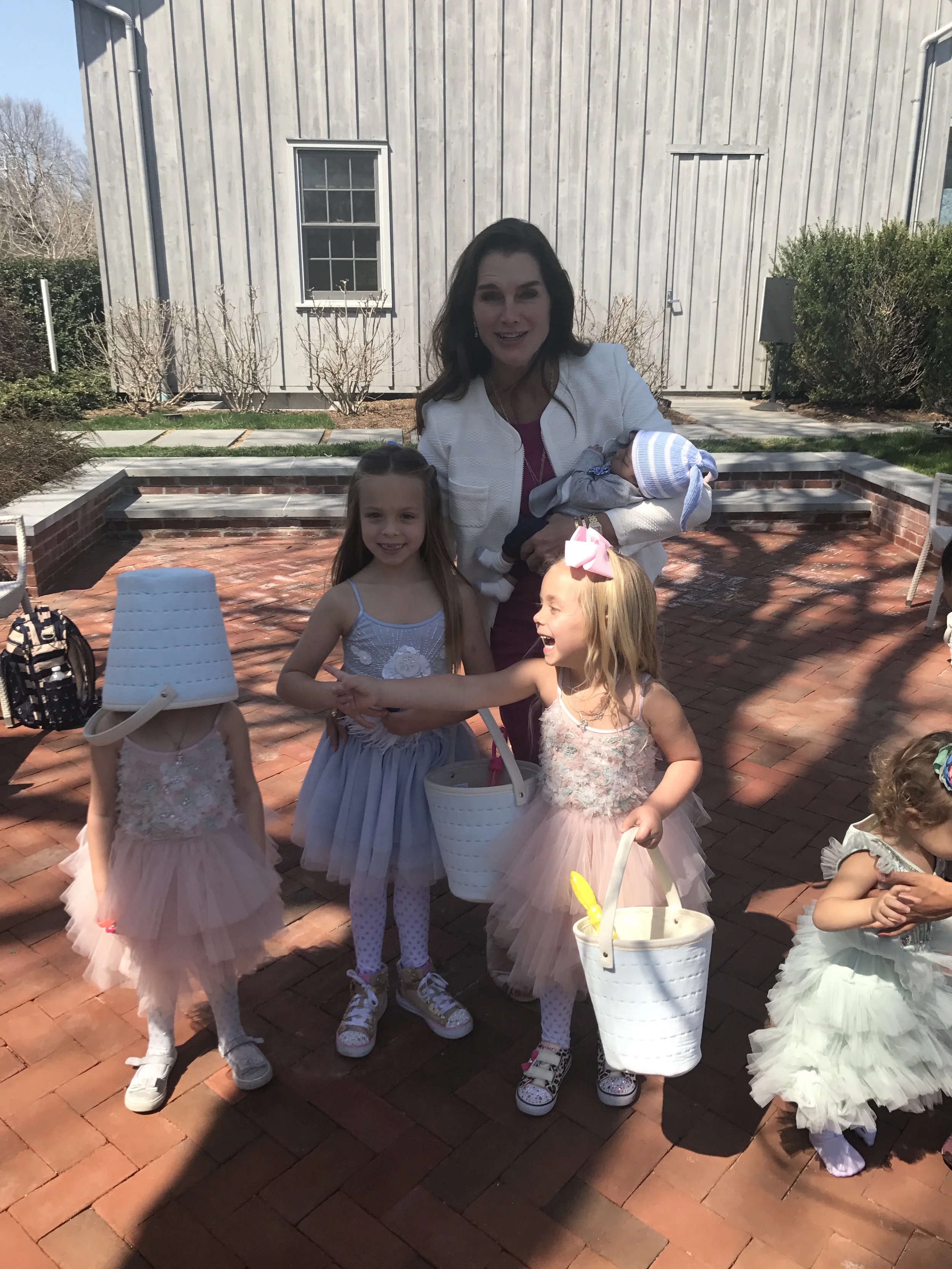 Thankfully, Brooke Shields, also a mother, thought my child refusing to take her Easter basket off her head, was a great photo opportunity.