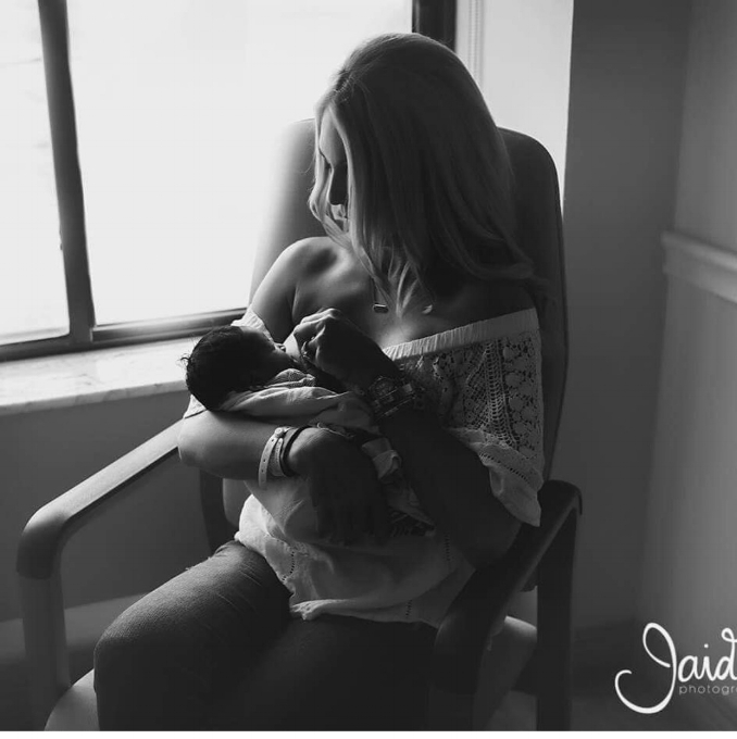 Adoptive breastfeeding at 48 hours.