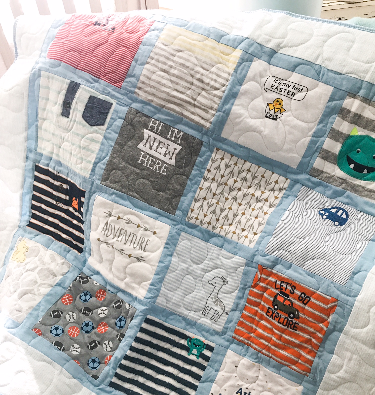 The quilt I had made for our birth mother. I saved many of the onesies I would normally donate and made a 16 square quilt as a keepsake. I will make one for myself as well.