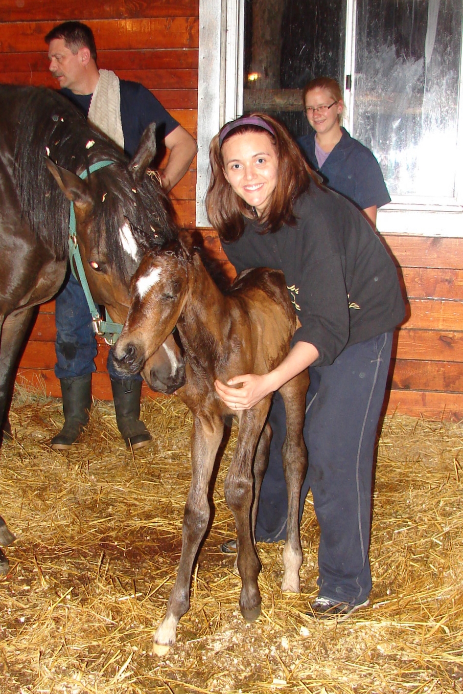 One of the vets from Dr. Hamilton's clinic, Dr. Gwenda Olson, was on hand to supervise the first hour of Weatherly's birth process, along with our daughter/photographer, Rachel.