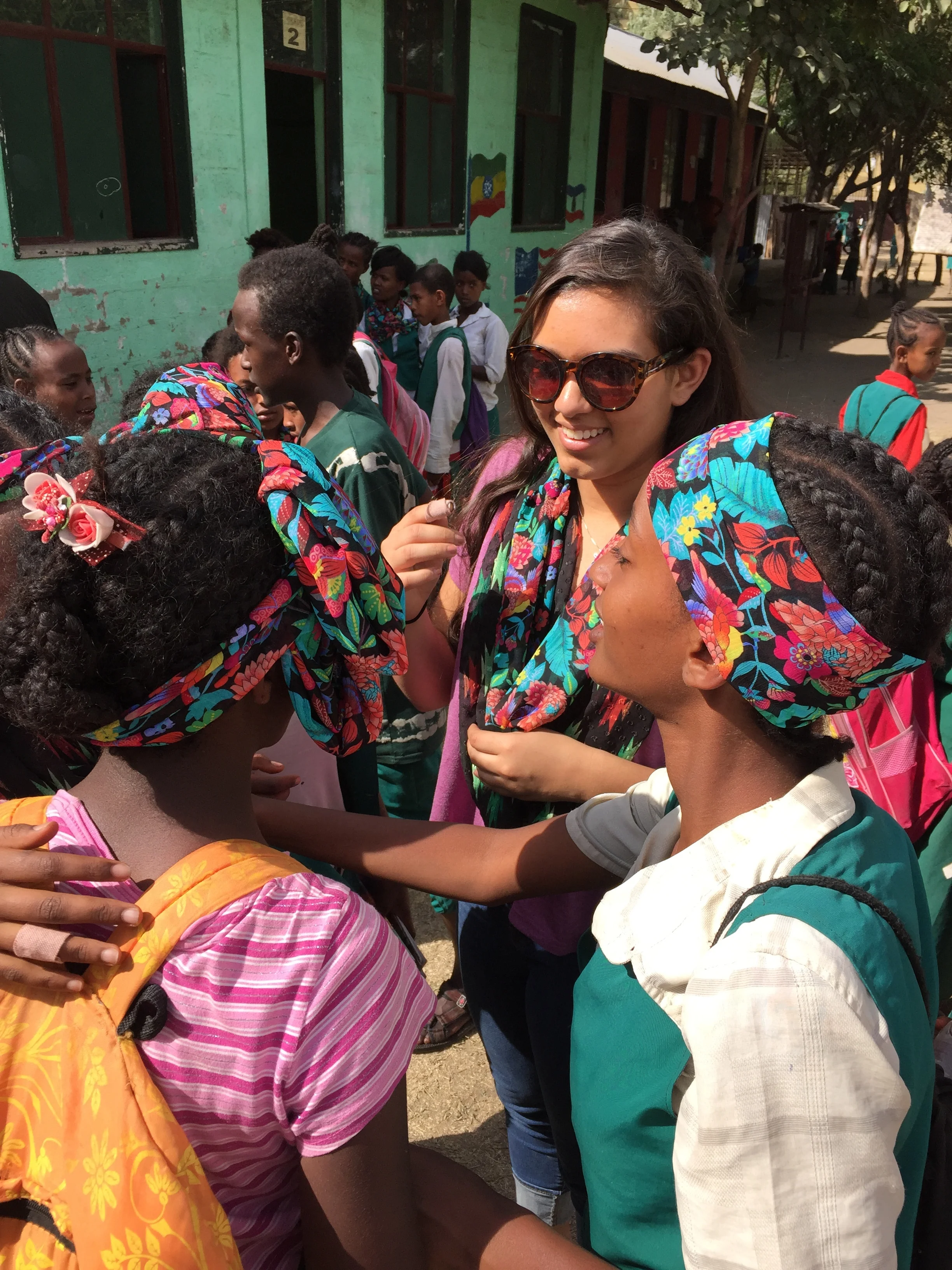 Jessica saying goodbye to girls who received scarves