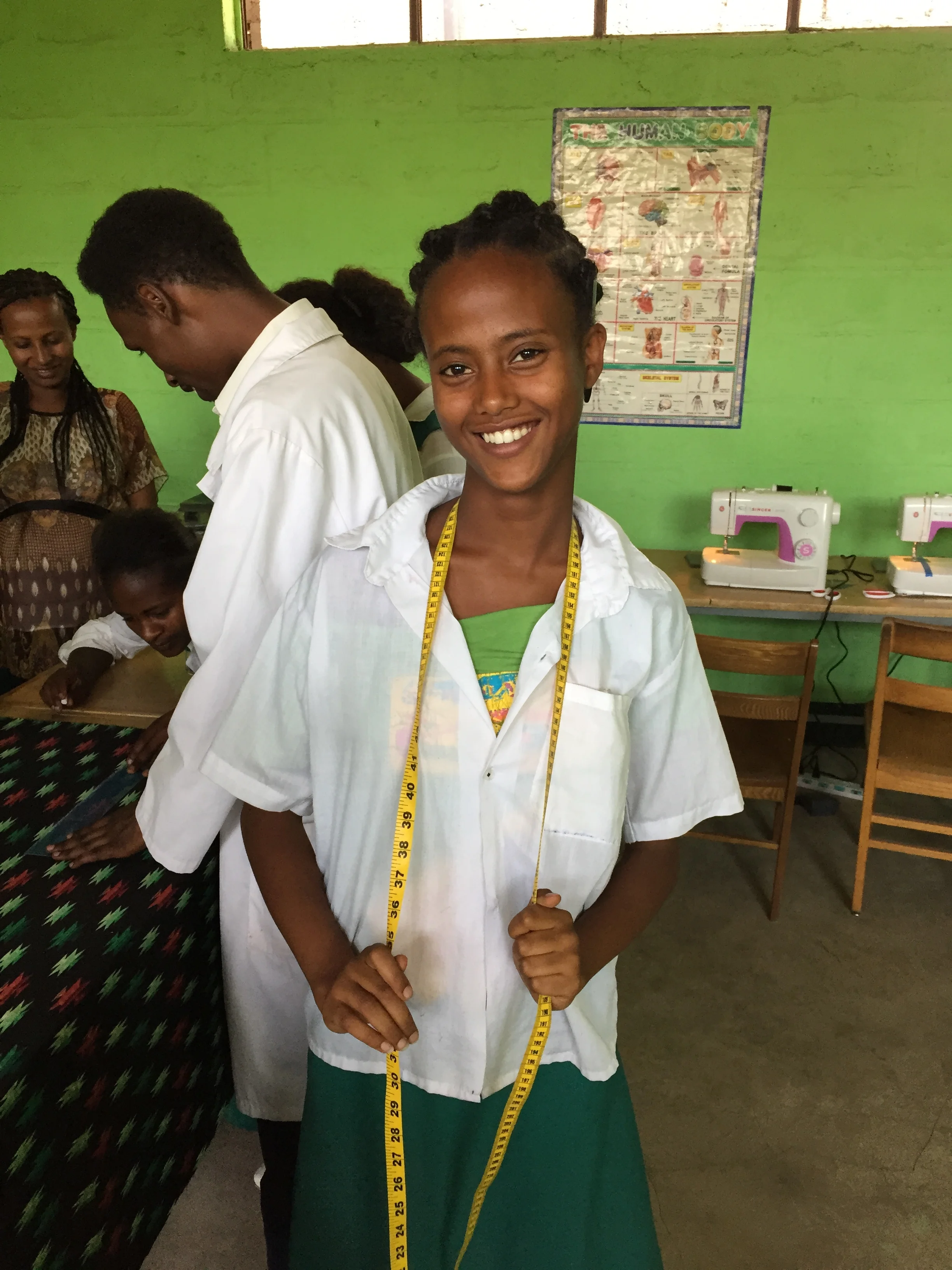 Misgana with measuring tape.JPG