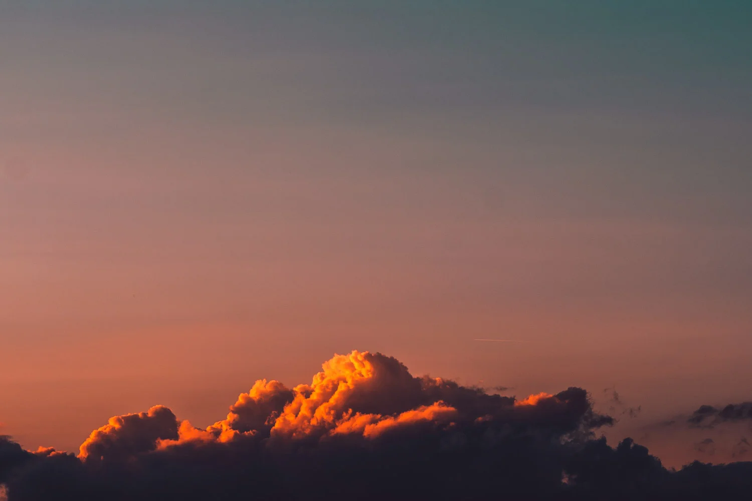 Clouds at sunset, resembling a mountain, over Timber Lakes. 