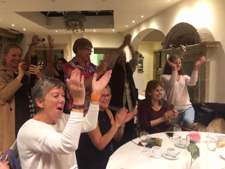 Applauding for the performance.