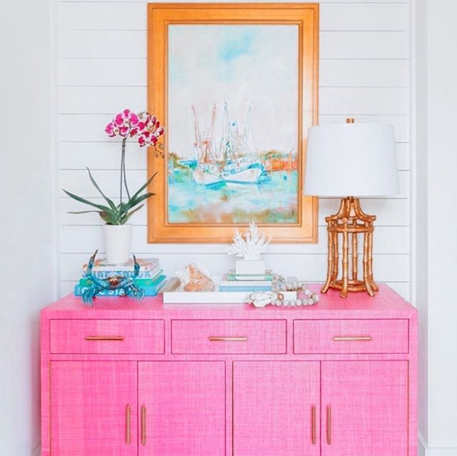 All things nautical ⚓️ + vibrant colors 💕 make for the b e s t decor 😍 One of my fave artists that I found through insta is @daniellecathercohenart - her use of color is *swoon* amazing. And every time I see a @societysocial piece, like this grasscloth credenza, I immediately wonder how I have made it so long without one in my life 🤯🙋♀️This is snap of @charlestonblonde home and I couldn’t be more in love with the whole set up! 🥰 #interiordesign #charleston #lowcountry #coastal #decor