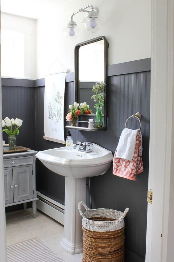 16-black-tall-wainscoting-is-a-dominating-decor-feature-in-this-bathroom-that-makes-the-space-look-bold.jpg