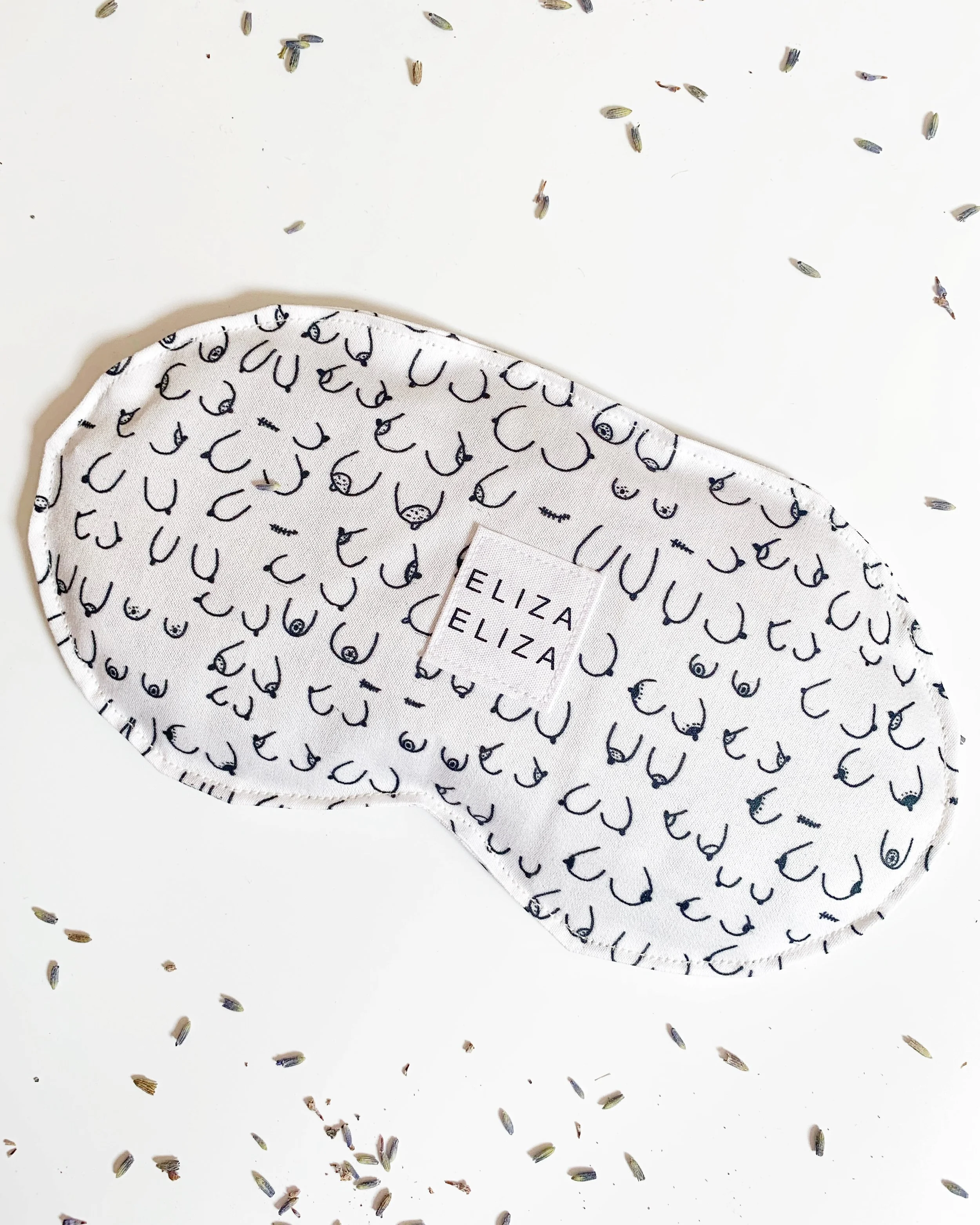 B Collection organic lavender flax seed cotton eye pillow surrounded by dried lavender