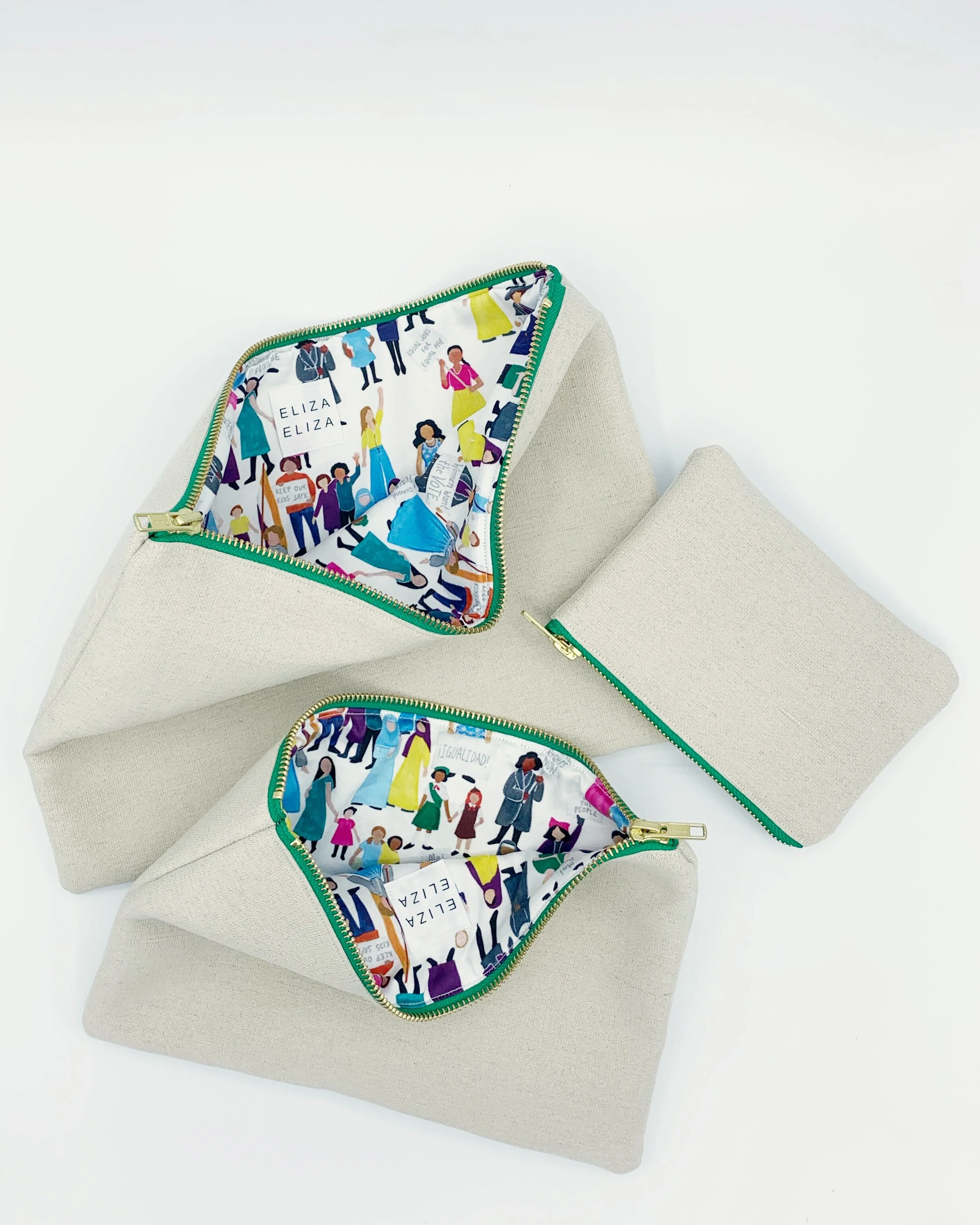 Eliza Eliza Equality Collection clutch bags and purse on white back lining women of all ethnicities cultures races religions ages