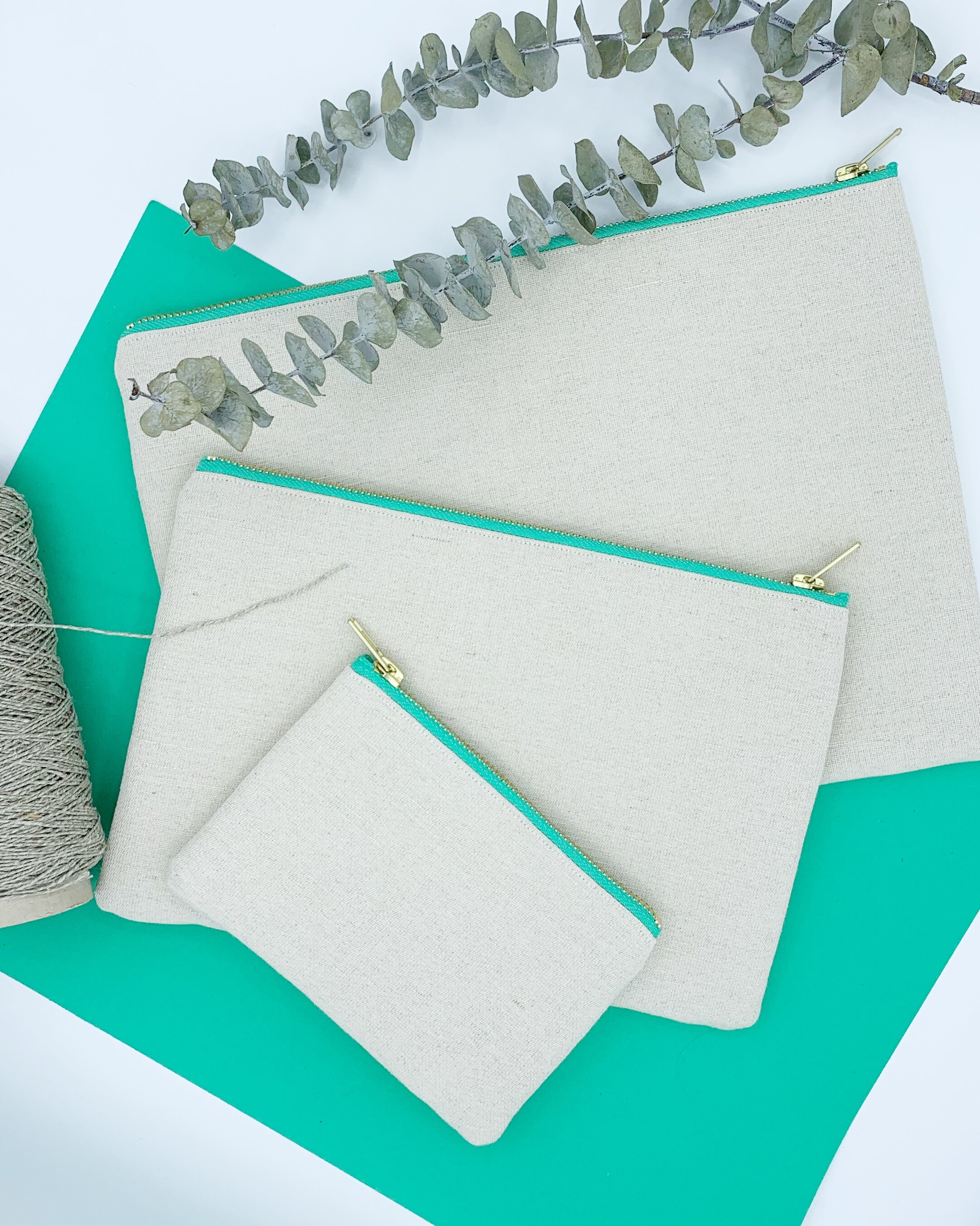 Flat lay Eliza Eliza turtle collection clutch bags purse eucalyptus hemp yarn