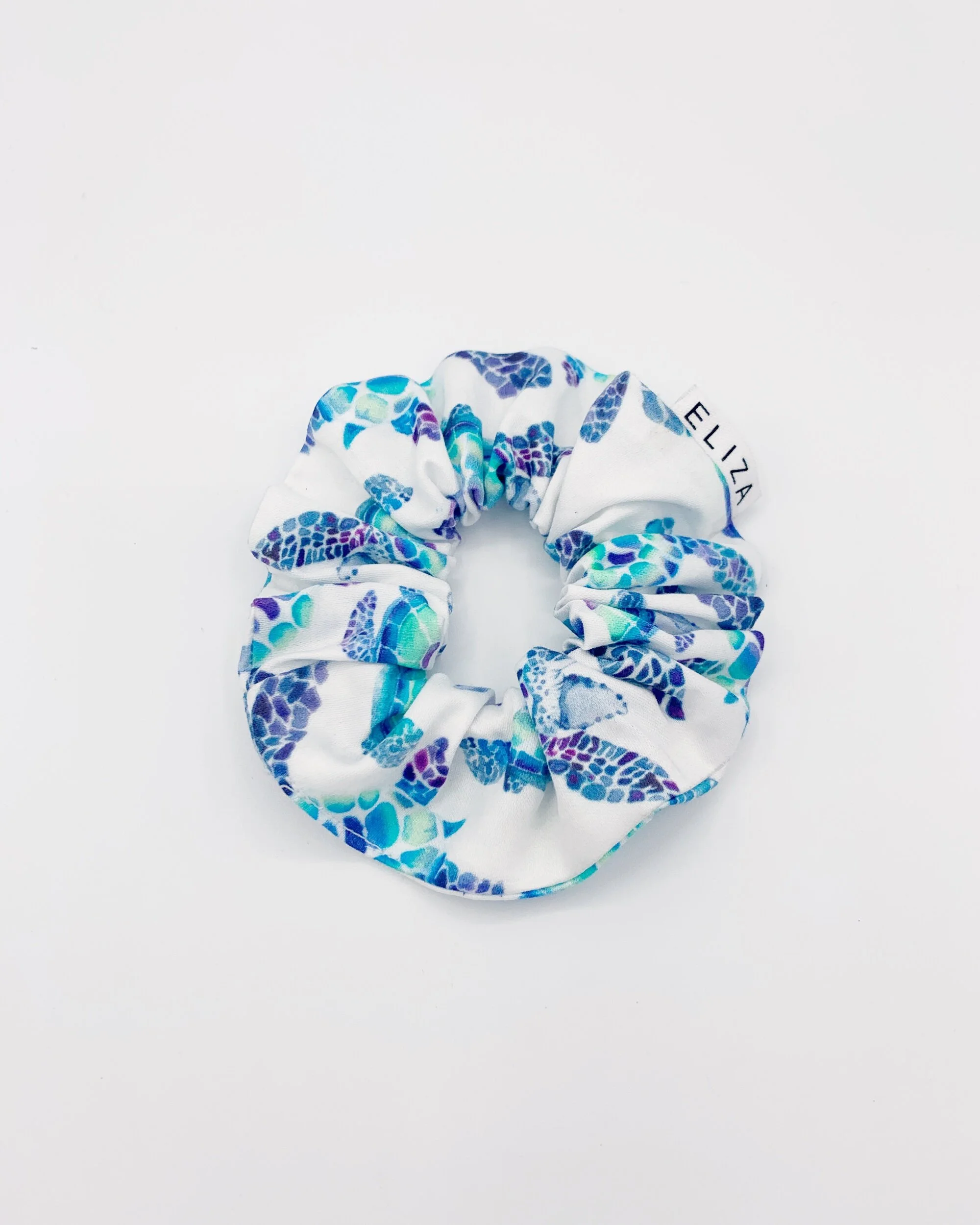 Organic cotton turtle collection Eliza Eliza blue aqua green scrunchie on white background