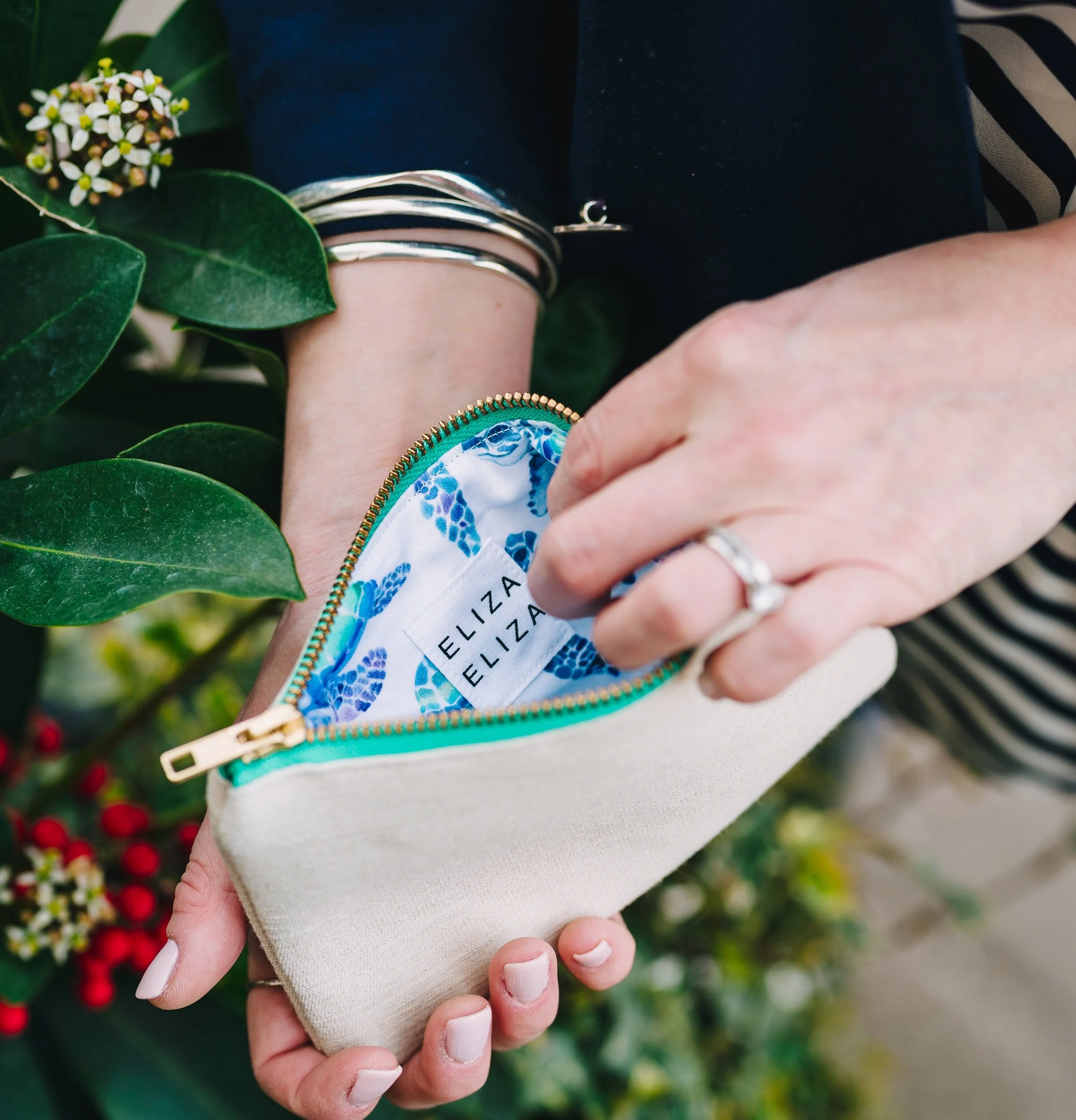 Eliza Eliza Turtle Purse being held open starting conversations endangered species