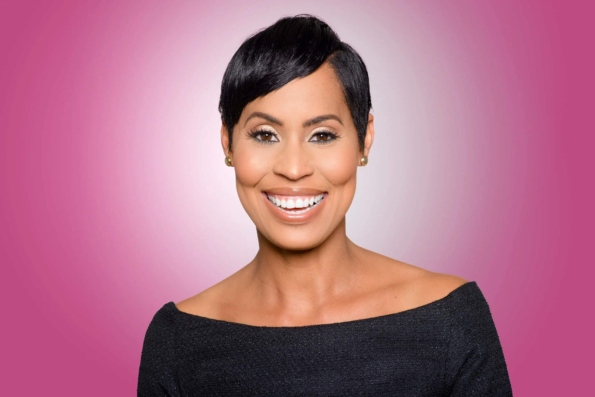 Naomi Garrick Headshot Pink.jpg