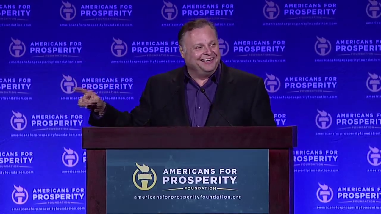 &nbsp; &nbsp; Rusty Humphries speaking to a large political gathering.