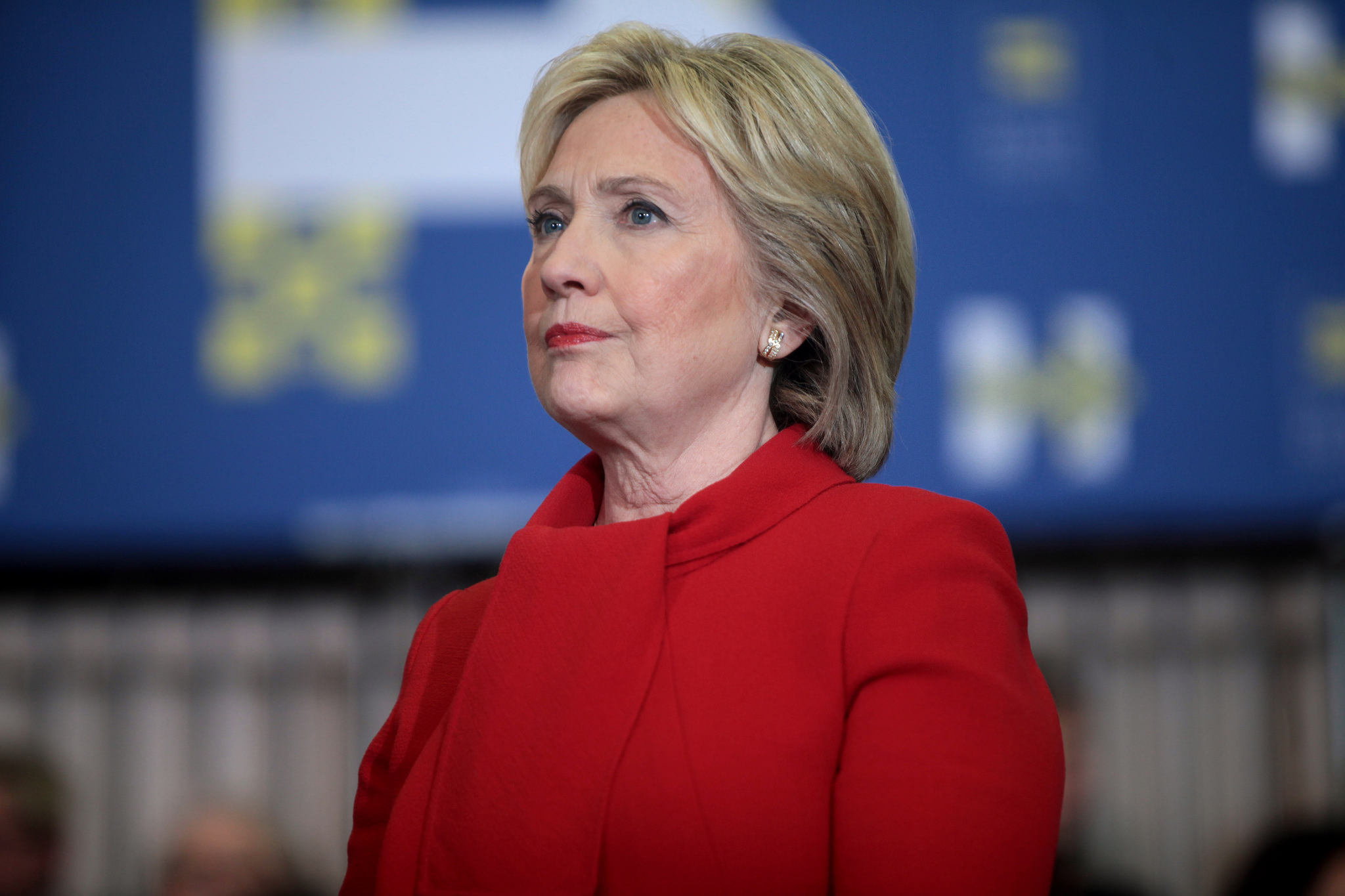 LOOKING FORWARDS: Hillary Clinton speaking with supporters at a “Get Out the Caucus” rally at Valley Southwoods Freshman High School in West Des Moines, Iowa. Image credit: Flicker, Photo by Gage Skidmore.