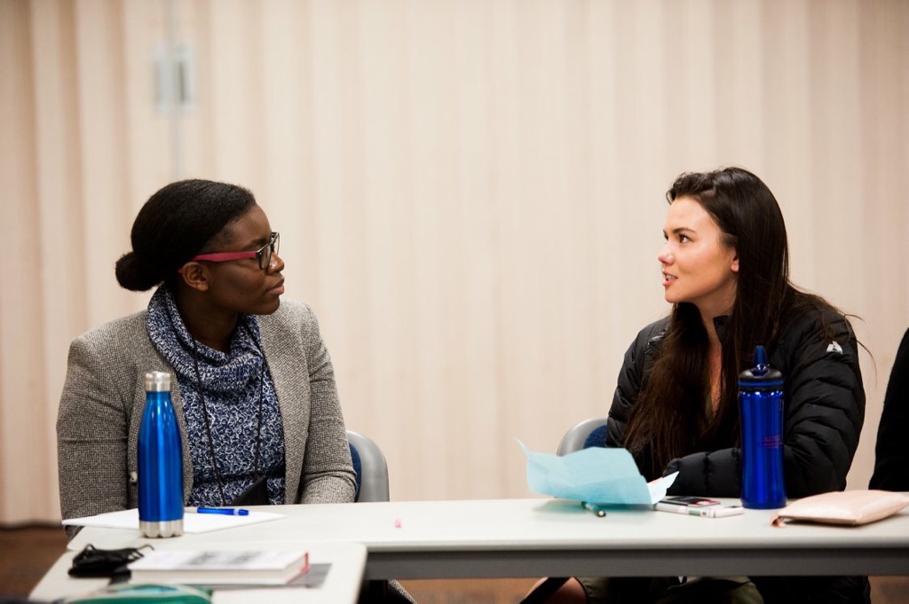 Linnea Uyneo '20 conversing with a fellow conference partipant during a leadership oriented excercise.