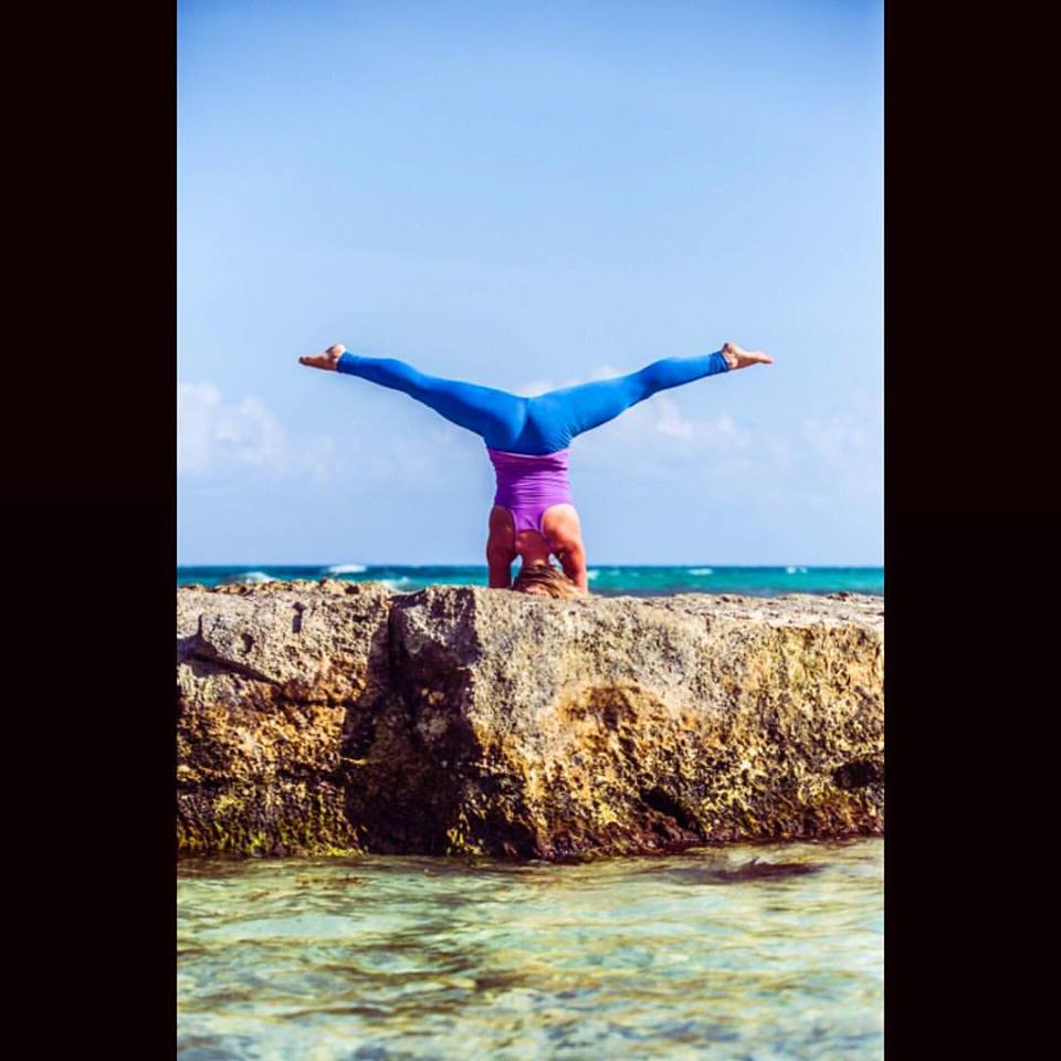 Mary is headstand and splits in Tulum Mexico blue pants.jpg