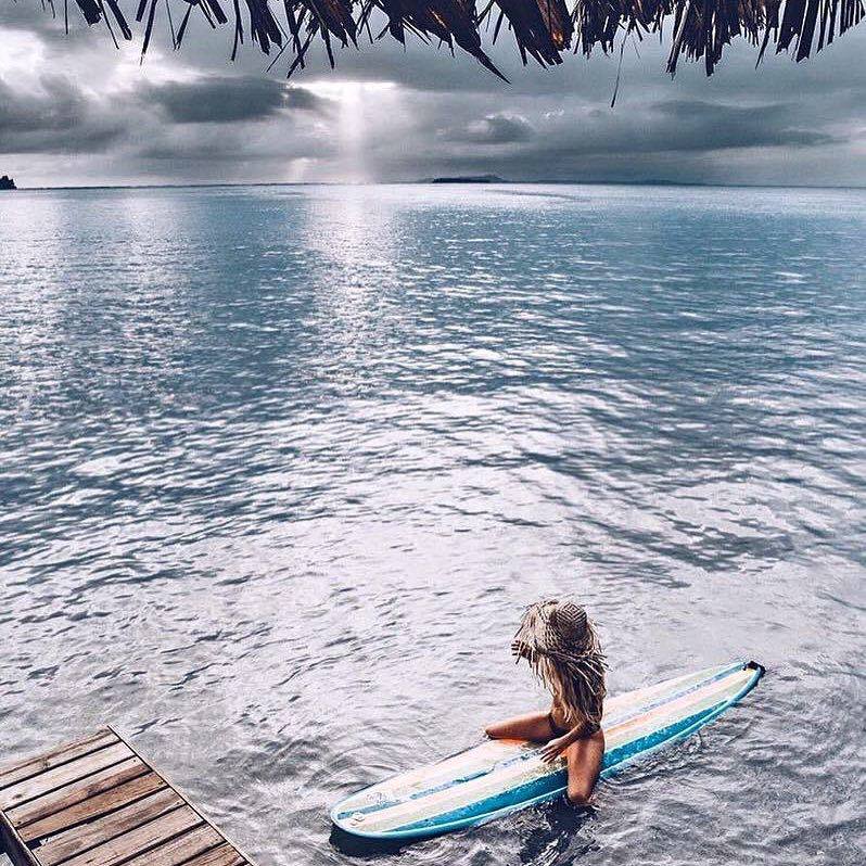 mary in cr sitting on surf board.jpg