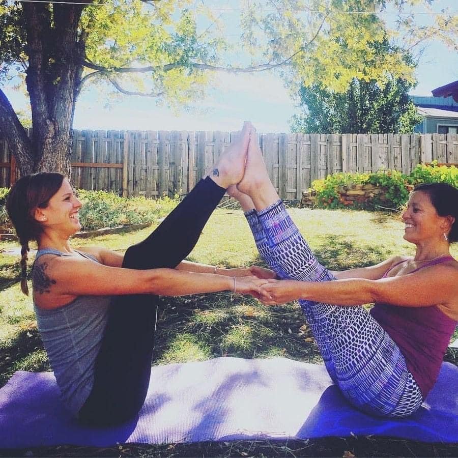 KYTT trainees in partner boat pose in boulder .jpeg