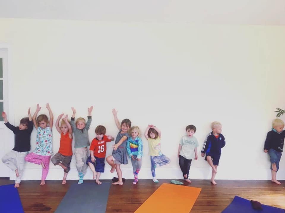 ayfk kids yoga - preschool class - tree pose against the wall .jpeg