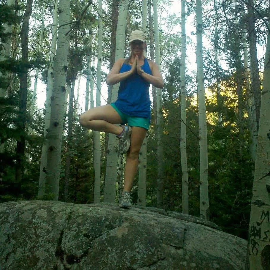 Mary in tree pose on rock .jpeg
