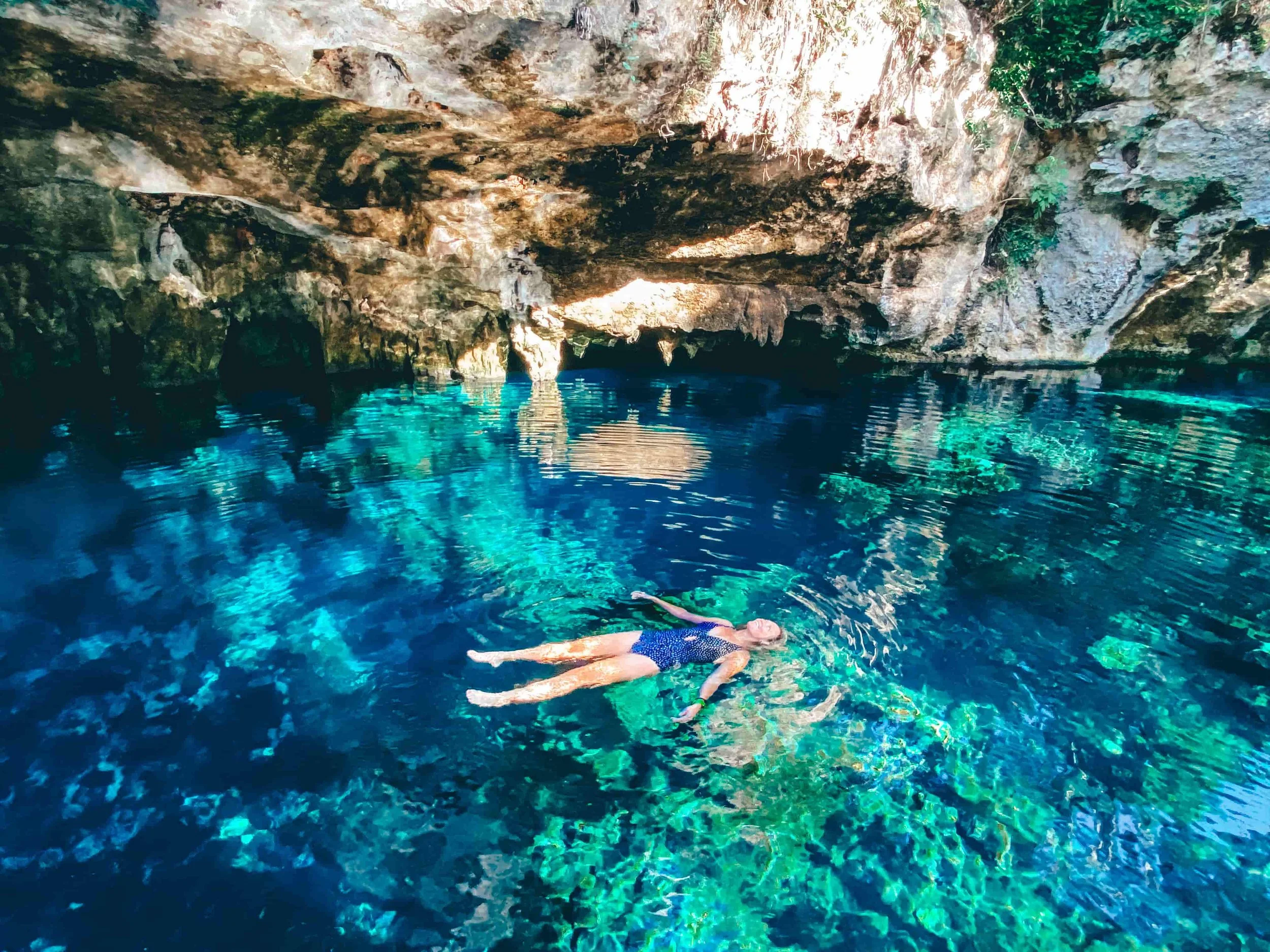 tulum cenote pic girl floating.jpeg