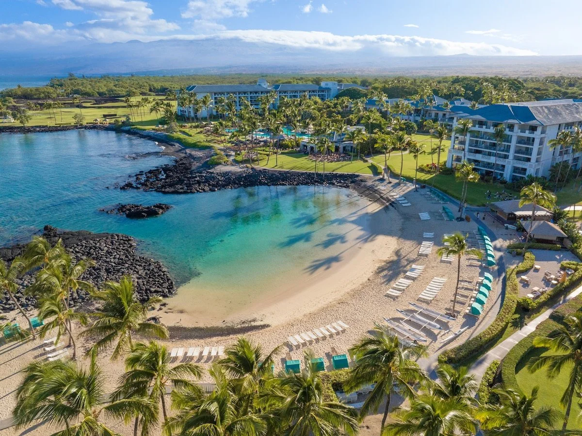Big Island Fairmont Orchid Hotel - beach view shot overhead with cgairs .jpeg