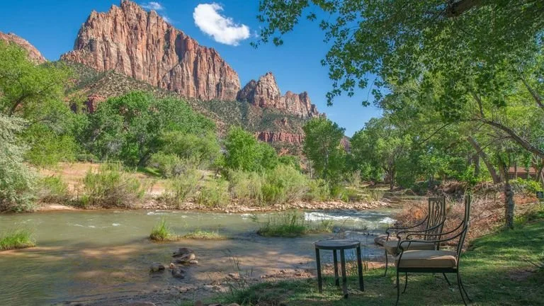Zion Retreat CliffRose Riverffront shot with chairs.jpeg