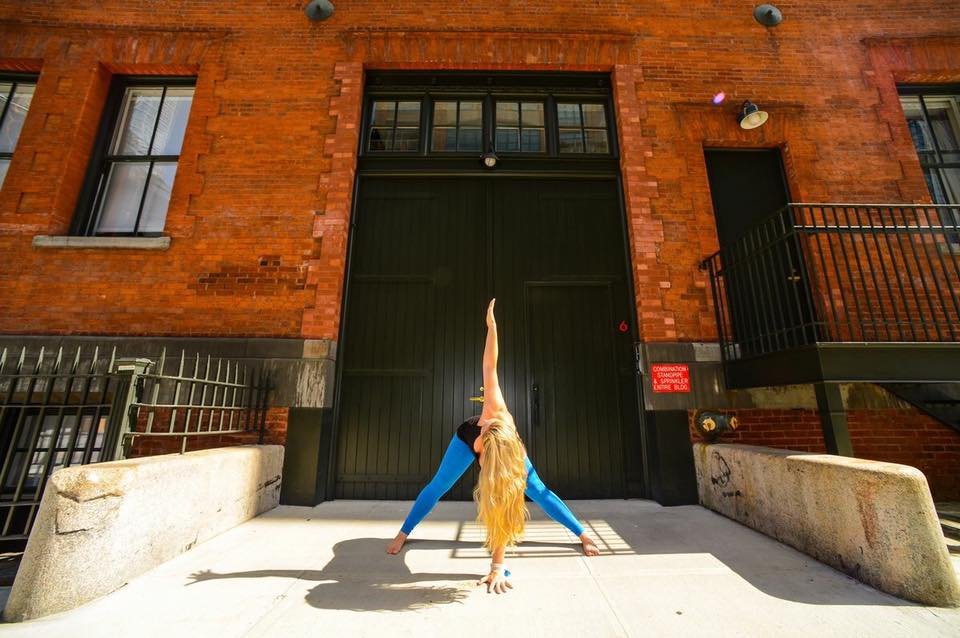 mary stults in twisting parivrita paddotanasana.jpeg