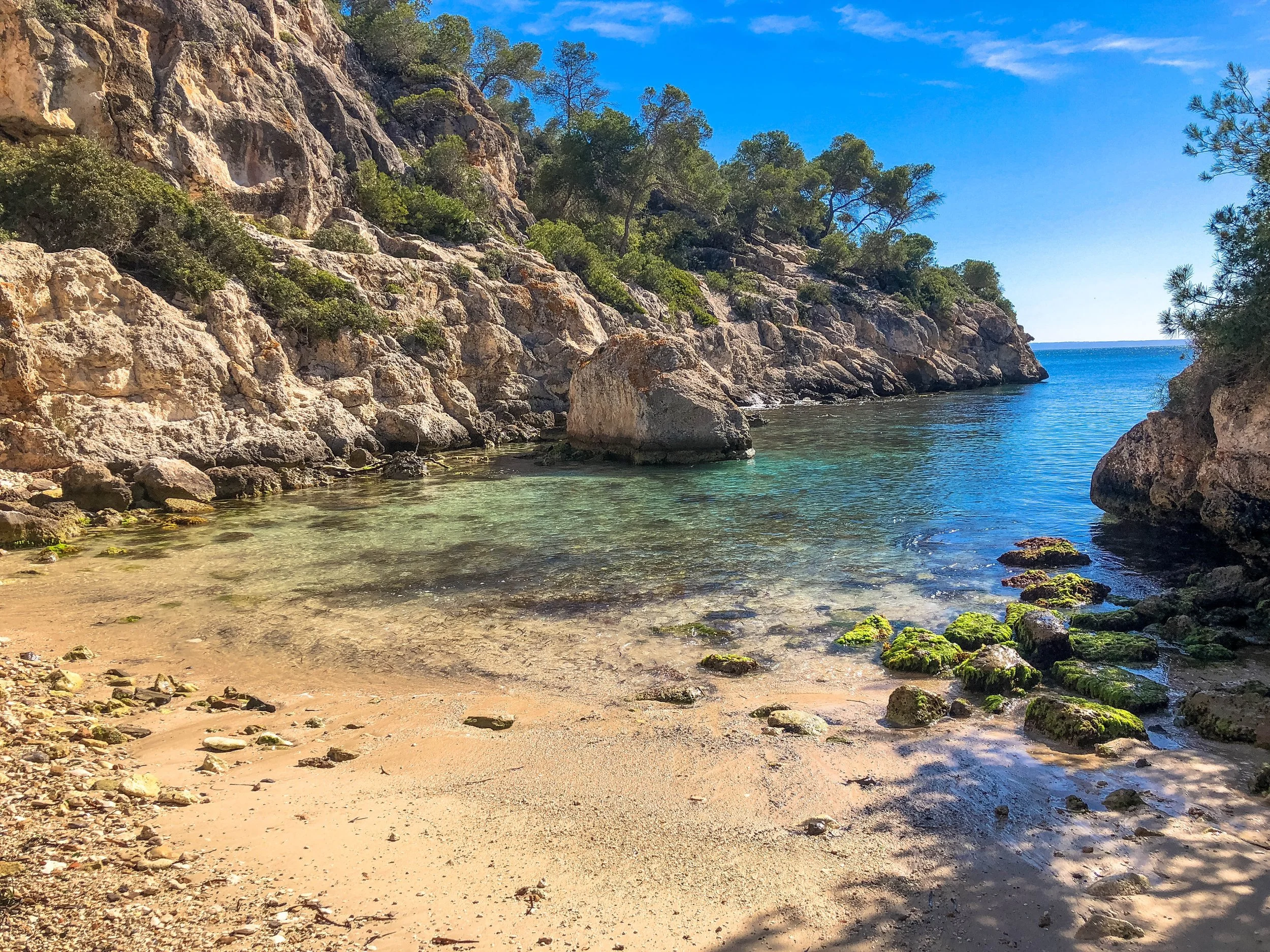 mallorca beach and cove with stones on sand .jpg