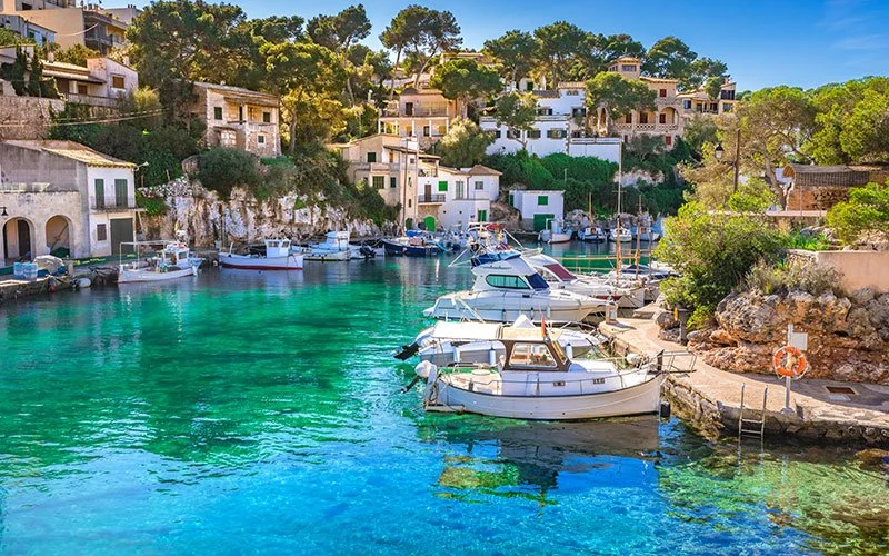 Mallorca port pic with boats and pretty water .jpg