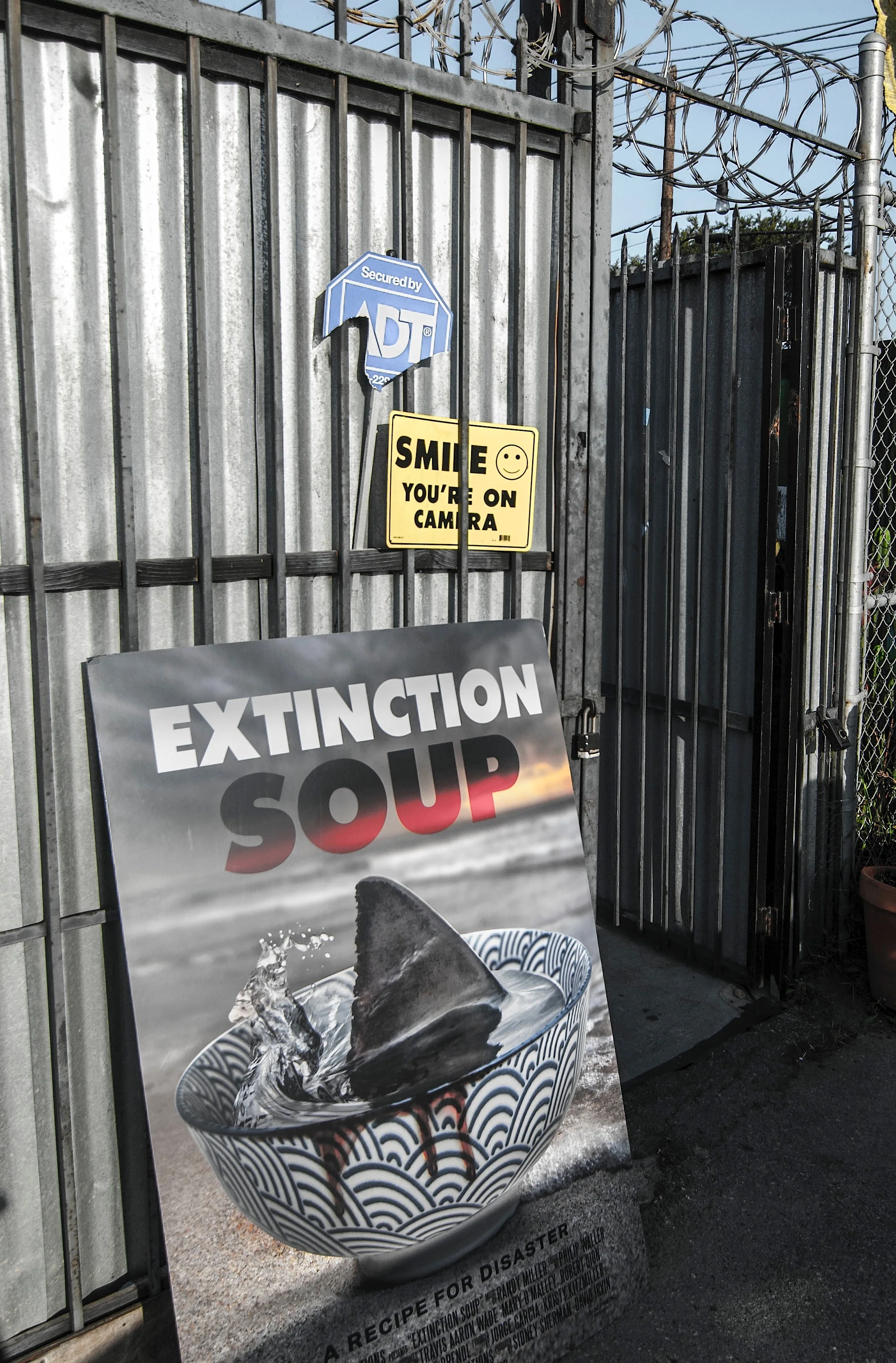 Extinction Soup fim sign