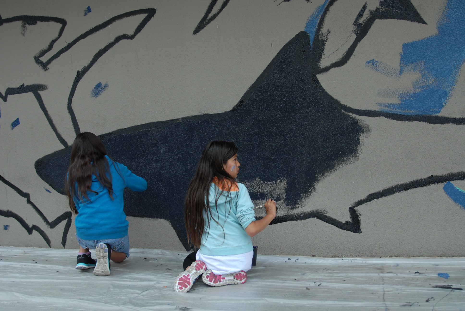 Kids painting the shark mural 5