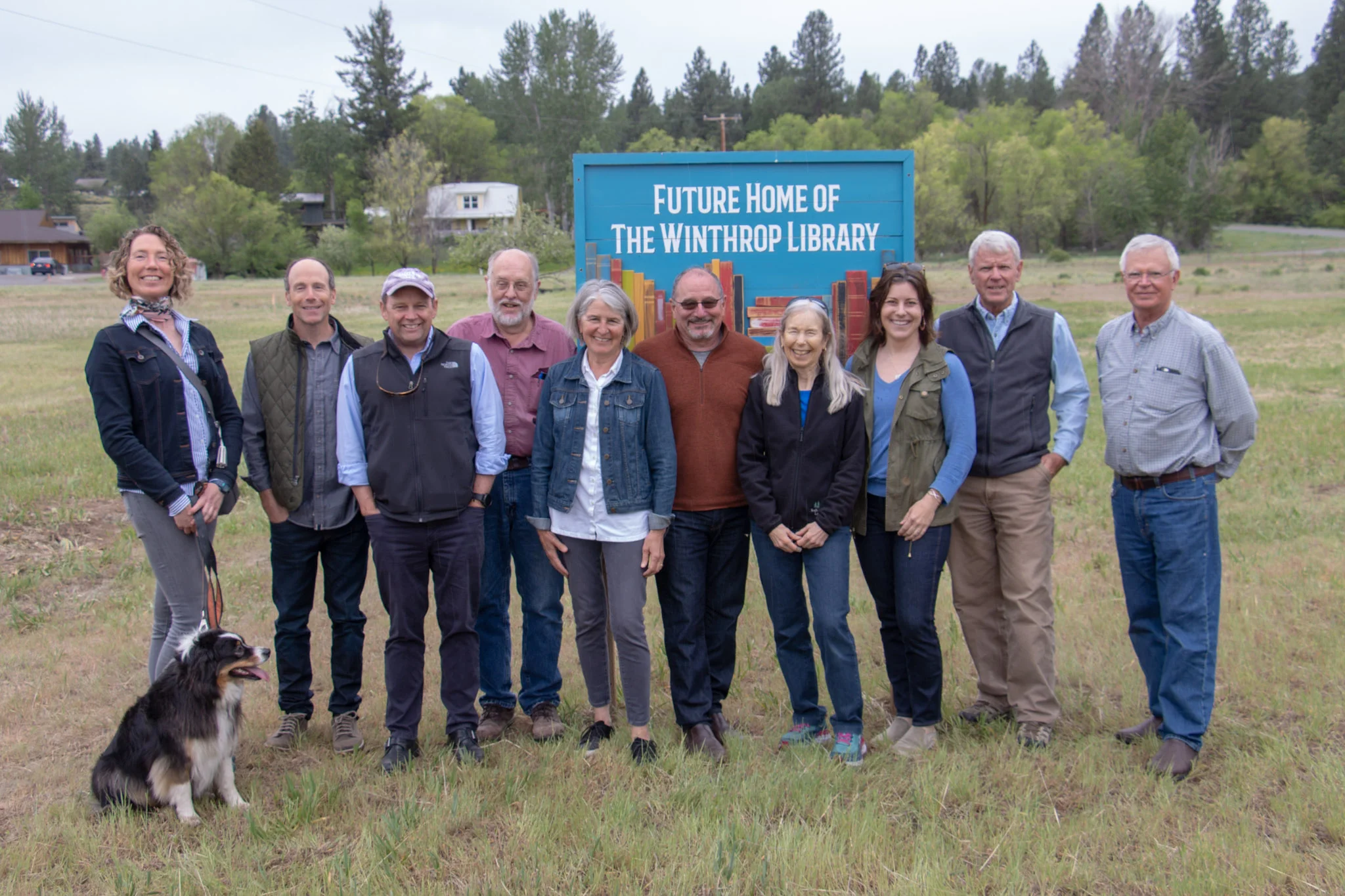 Representatives of the board, advisory board, Town Council and architects celebrate signing a letter of agreement for schematics!